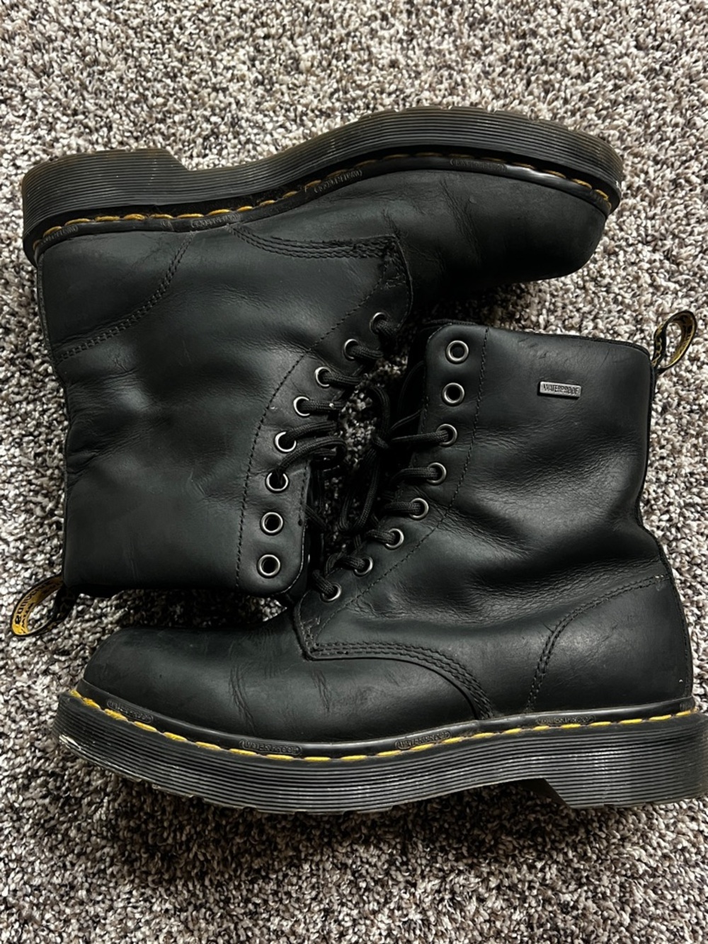 Dr. Martens Black Leather 8-Eye Lace-Up Boots with Yellow Stitching